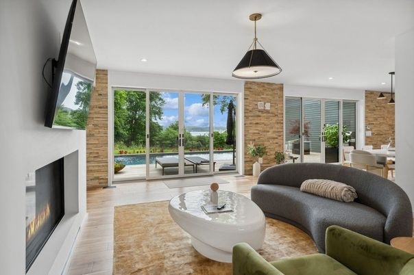 Fireplace, Interior, Living room, Pendant Lights, Recessed Lighting, Stone Walls, Wood Texture Flooring