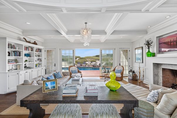 Chandelier, Fireplace, Interior, Living room, Recessed Lighting, Water, Wood Texture Flooring