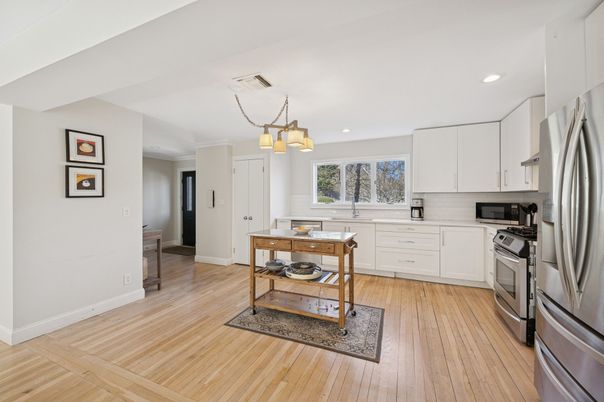 Chandelier, Interior, Kitchen, Pendant Lights, Recessed Lighting, Stainless Steel Appliances, Wood Texture Flooring