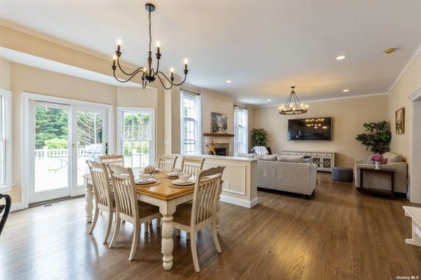 Chandelier, Dining room, Fireplace, Interior, Living room, Recessed Lighting, Wood Texture Flooring