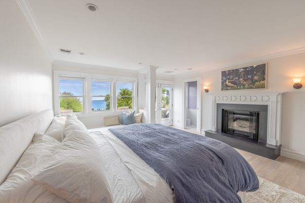 Bedroom, Fireplace, Interior, Recessed Lighting, Water, Wood Texture Flooring