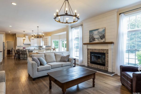 Chandelier, Dining room, Fireplace, Interior, Kitchen, Living room, Pendant Lights, Recessed Lighting, Wood Texture Flooring