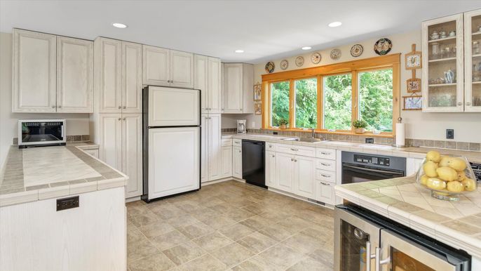 Interior, Kitchen, Recessed Lighting, Stainless Steel Appliances, Tile Countertops