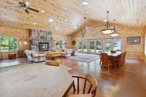 Dining room, Fireplace, Interior, Living room, Pendant Lights, Recessed Lighting, Stone Walls, Wooden Ceilings, Wooden Walls