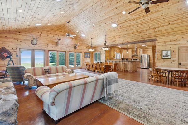 Dining room, Interior, Kitchen, Living room, Pendant Lights, Recessed Lighting, Stainless Steel Appliances, Wooden Ceilings, Wood Texture Flooring, Wooden Walls