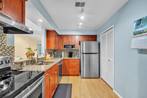 Interior, Kitchen, Recessed Lighting, Stainless Steel Appliances, Wood Texture Flooring