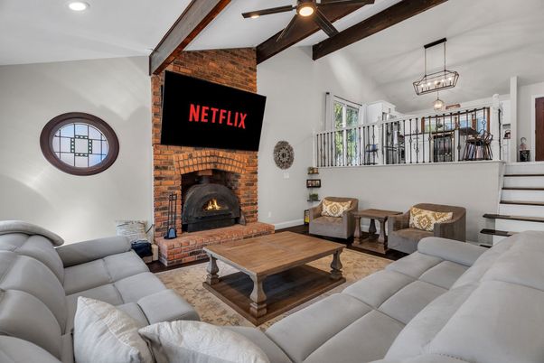 Fireplace, Interior, Living room, Pendant Lights, Recessed Lighting, Stone Walls, Wooden Beams