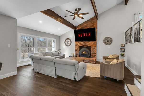 Fireplace, Interior, Living room, Recessed Lighting, Stone Walls, Wooden Beams, Wood Texture Flooring