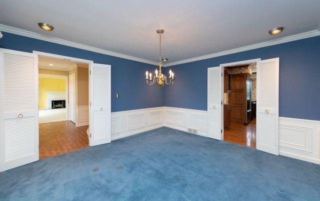 Chandelier, Empty room, Fireplace, Interior, Recessed Lighting, Wood Texture Flooring