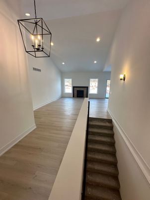 Fireplace, Interior, Pendant Lights, Recessed Lighting, Wood Texture Flooring