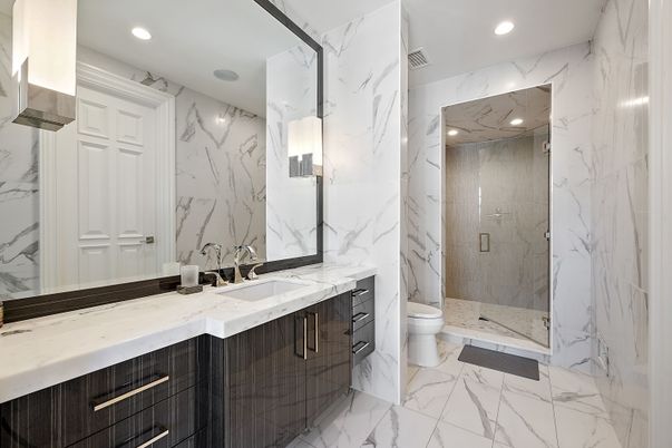 Bathroom, Dual Sink Vanities, Glass Shower, Interior, Marble, Marble Walls, Recessed Lighting