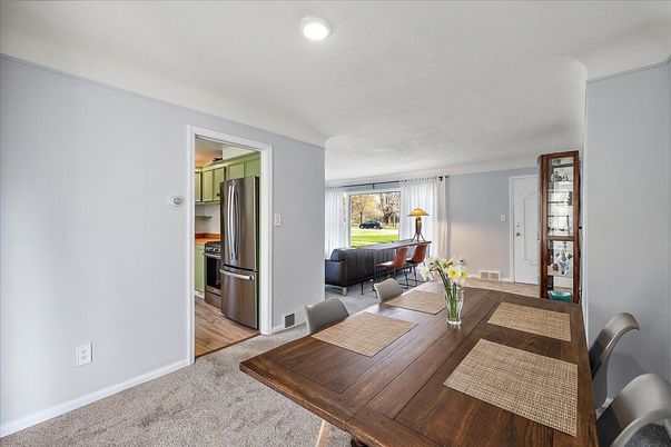 Dining room, Interior, Kitchen, Living room, Recessed Lighting, Stainless Steel Appliances, Wood Texture Flooring