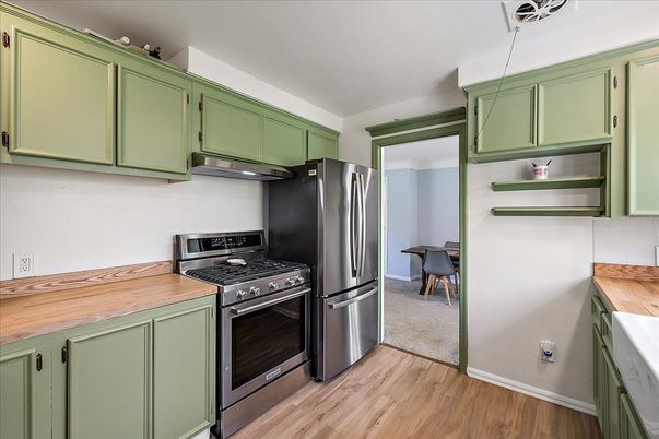 Dining room, Interior, Kitchen, Pendant Lights, Stainless Steel Appliances, Wood Texture Flooring