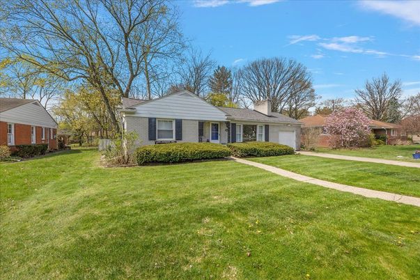 Attached, Backyard, Exterior, Facade, Brick Facade, Ranch
