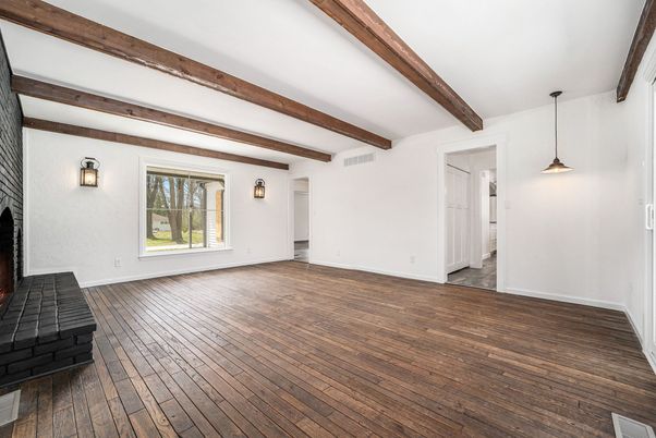 Empty room, Fireplace, Interior, Pendant Lights, Wooden Beams, Wood Texture Flooring