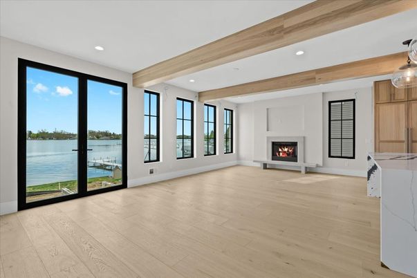Empty room, Fireplace, Interior, Recessed Lighting, Water, Wooden Beams, Wood Texture Flooring