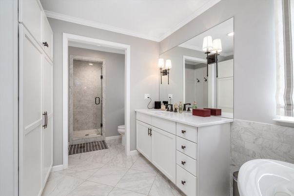 Bathroom, Dual Sink Vanities, Glass Shower, Interior, Marble, Recessed Lighting