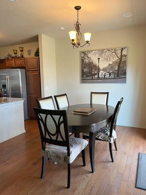 Chandelier, Dining room, Interior, Kitchen, Recessed Lighting, Stainless Steel Appliances, Wood Texture Flooring