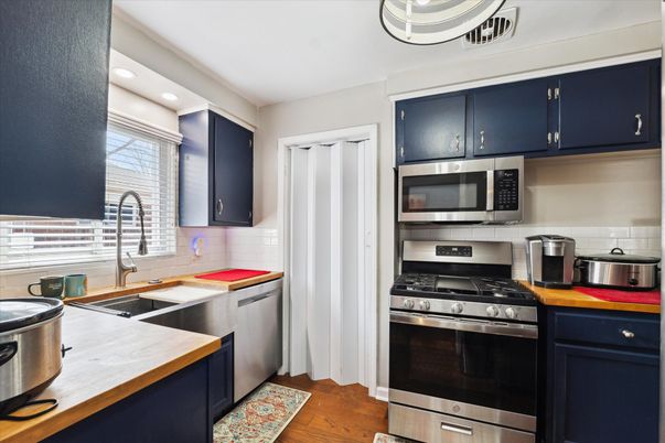 Interior, Kitchen, Recessed Lighting, Stainless Steel Appliances, Wood Texture Flooring