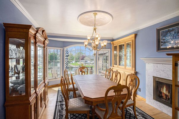 Chandelier, Dining room, Fireplace, Interior, Wood Texture Flooring