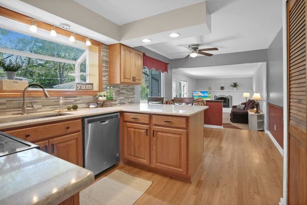Fireplace, Interior, Kitchen, Recessed Lighting, Wood Texture Flooring