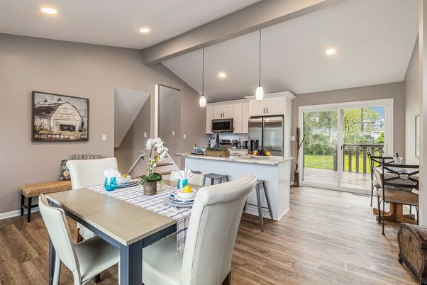 Dining room, Interior, Kitchen, Pendant Lights, Recessed Lighting, Stainless Steel Appliances, Wood Texture Flooring
