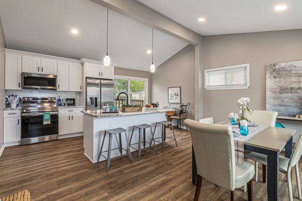Dining room, Interior, Kitchen, Pendant Lights, Recessed Lighting, Stainless Steel Appliances, Wood Texture Flooring