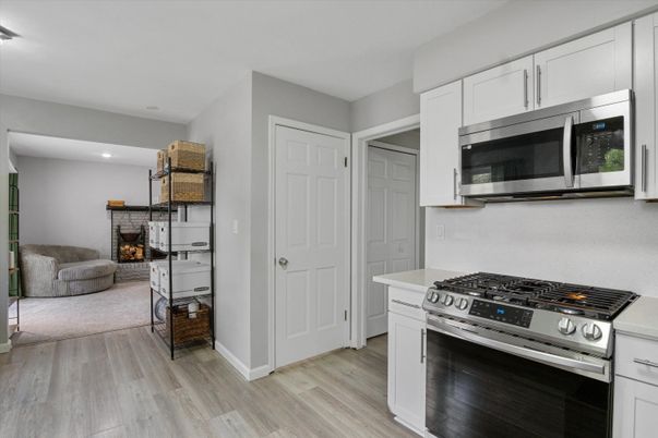Interior, Kitchen, Recessed Lighting, Stainless Steel Appliances, Wood Texture Flooring