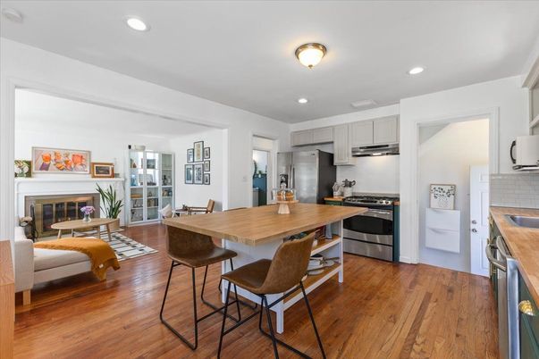 Dining room, Interior, Kitchen, Recessed Lighting, Stainless Steel Appliances, Wood Texture Flooring