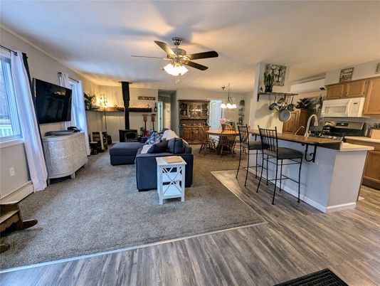 Dining room, Fireplace, Interior, Kitchen, Living room, Pendant Lights, Wood Texture Flooring