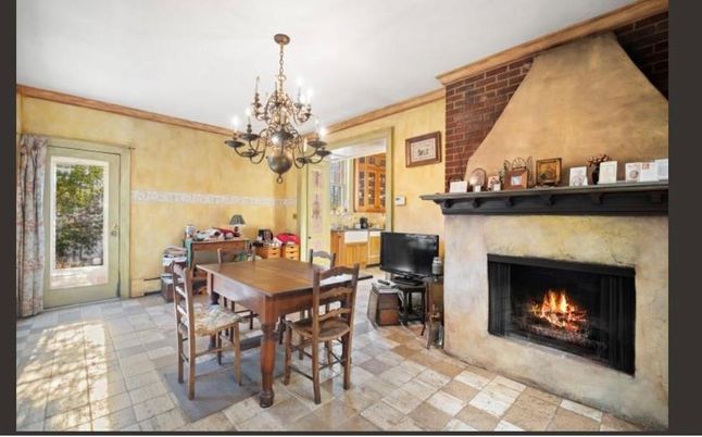 Chandelier, Dining room, Fireplace, Interior, Stone Walls