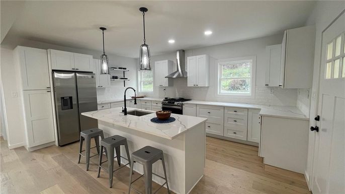 Interior, Kitchen, Pendant Lights, Recessed Lighting, Stainless Steel Appliances, Wood Texture Flooring