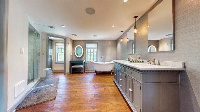 Bathroom, Dual Sink Vanities, Free Standing Baths, Glass Shower, Interior, Pendant Lights, Recessed Lighting, Wood Texture Flooring