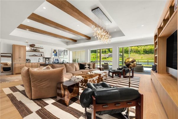 Chandelier, Interior, Living room, Recessed Lighting, Wooden Beams, Wood Texture Flooring