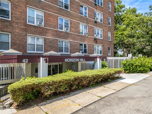 Exterior, Facade, Brick Facade, Condo Building