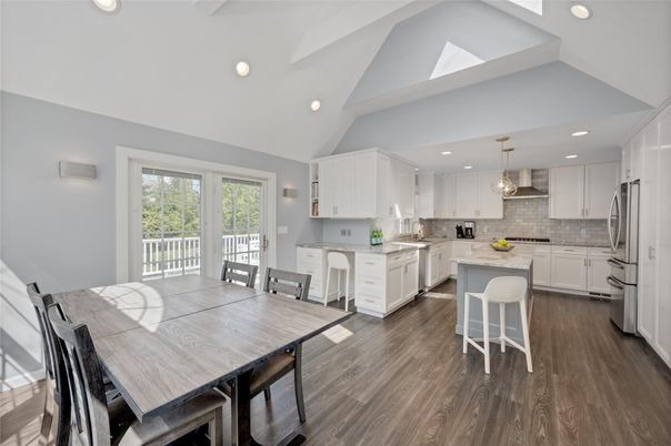 Dining room, Interior, Kitchen, Pendant Lights, Recessed Lighting, Stainless Steel Appliances, Wood Texture Flooring