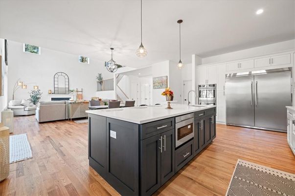 Dining room, Interior, Kitchen, Living room, Pendant Lights, Recessed Lighting, Stainless Steel Appliances, Wood Texture Flooring