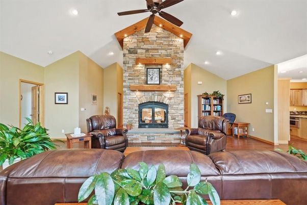 Fireplace, Interior, Kitchen, Living room, Recessed Lighting, Stone Walls, Wood Texture Flooring
