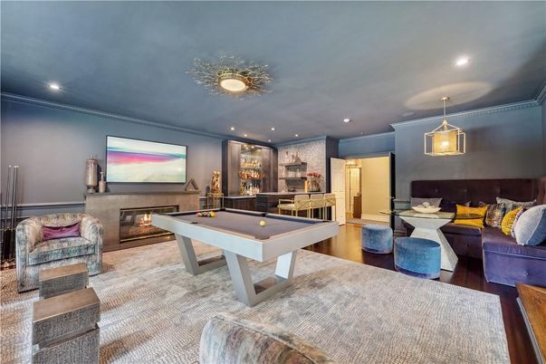 Billiard Table, Fireplace, Game Room, Interior, Living room, Pendant Lights, Recessed Lighting, Wood Texture Flooring