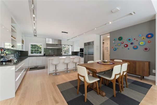 Dining room, Interior, Kitchen, Pendant Lights, Recessed Lighting, Stainless Steel Appliances, Wood Texture Flooring
