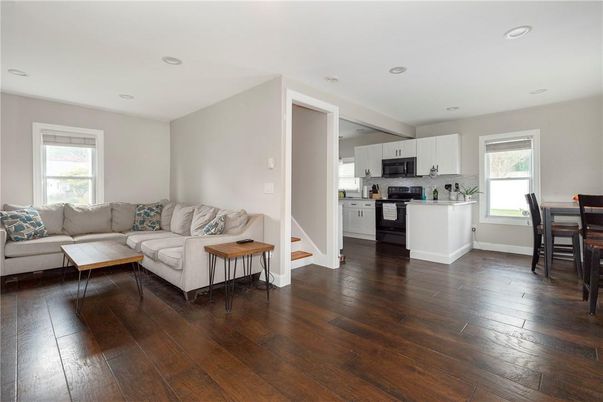 Dining room, Interior, Kitchen, Living room, Recessed Lighting, Stainless Steel Appliances, Wood Texture Flooring