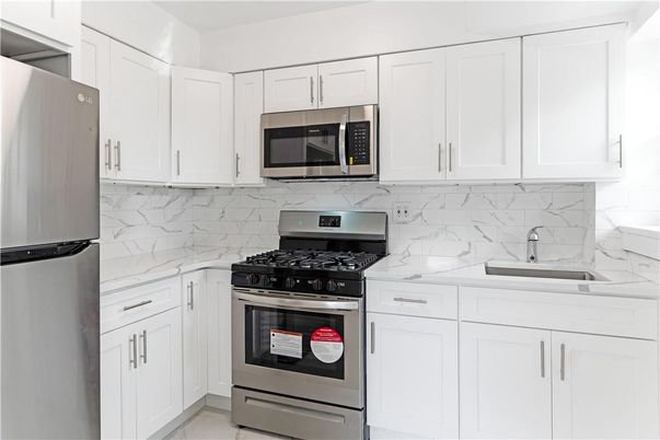 Interior, Kitchen, Marble, Marble Walls, Stainless Steel Appliances
