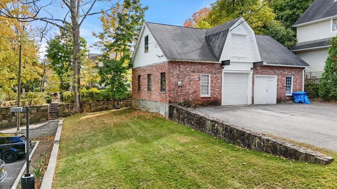 Attached, Backyard, Exterior, Facade, Brick Facade, Cape Cod