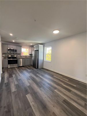 Interior, Kitchen, Recessed Lighting, Stainless Steel Appliances, Wood Texture Flooring