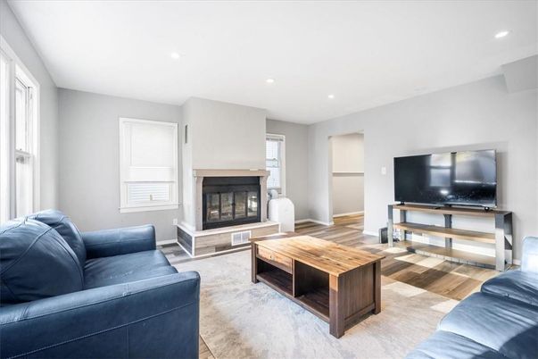 Fireplace, Interior, Living room, Recessed Lighting, Wood Texture Flooring