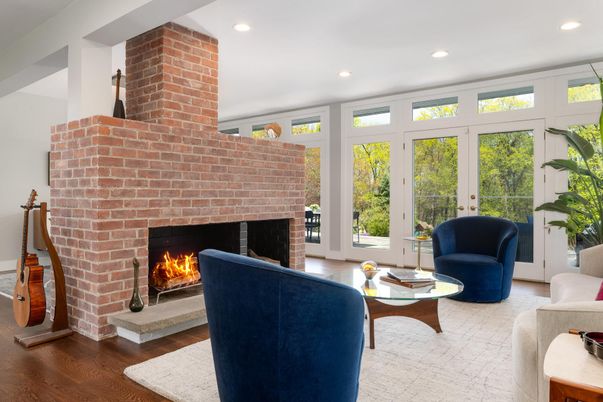 Fireplace, Interior, Living room, Recessed Lighting, Stone Walls, Wood Texture Flooring