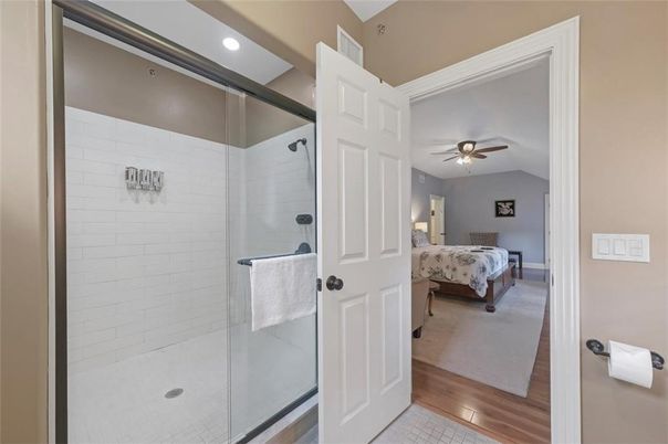 Bathroom, Bedroom, Glass Shower, Interior, Recessed Lighting, Wood Texture Flooring