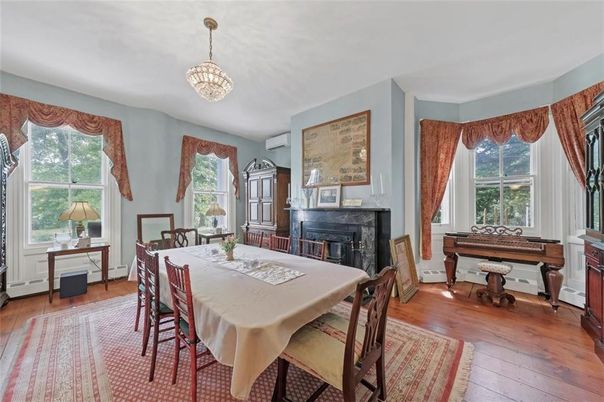 Chandelier, Dining room, Fireplace, Interior, Piano, Wood Texture Flooring