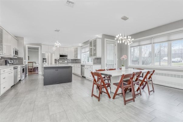 Dining room, Interior, Kitchen, Pendant Lights, Stainless Steel Appliances, Wood Texture Flooring