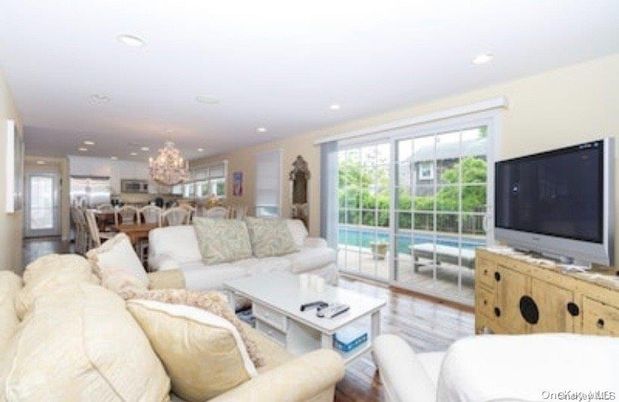 Chandelier, Dining room, Interior, Kitchen, Living room, Recessed Lighting, Stainless Steel Appliances, Wood Texture Flooring